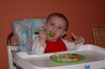 Toddler eating Thanksgiving dinner for "advice for new moms"